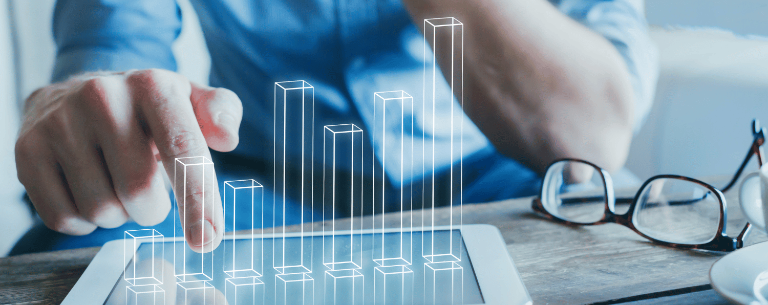 Person Interacting with a Tablet Displaying a 3d Bar Graph, Symbolizing Ecommerce Roi and Data-driven Performance Analysis.