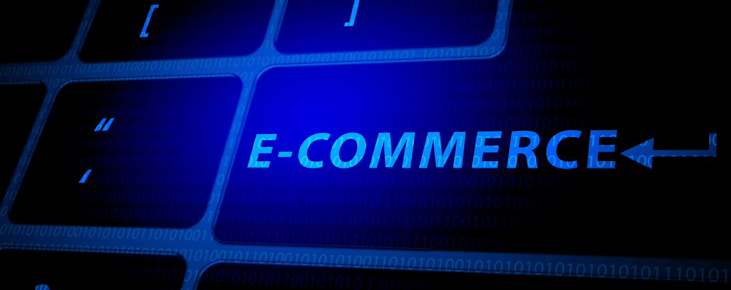 Glowing "e-commerce" Text on a Digital Keyboard, Symbolizing Online Retail and Digital Business Solutions.