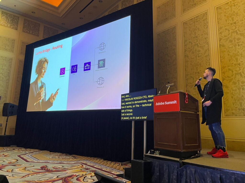 Yaroslav Rogoza Presenting Atwix's Luma Bridge Routing Solution During Adobe Summit, Highlighting Technical Integration with Adobe Commerce.