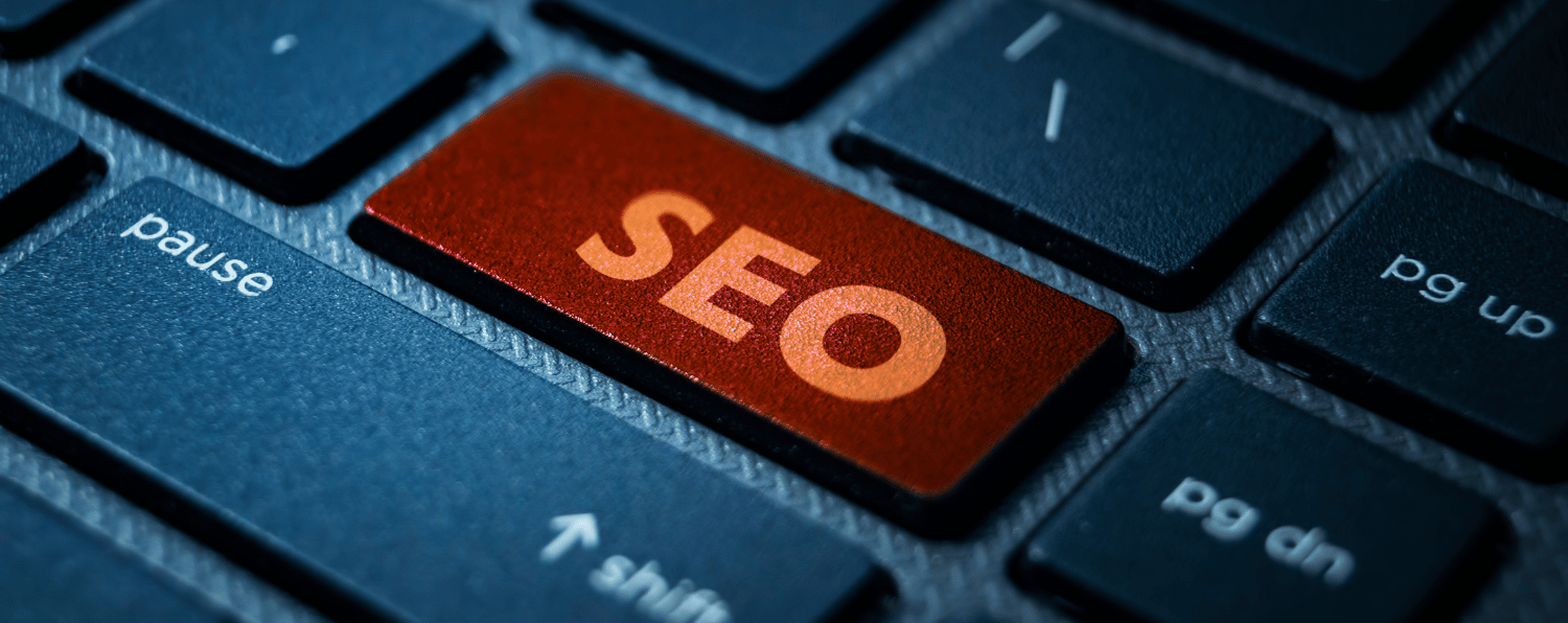 Keyboard with Red Seo Key, Highlighting Magento Seo Optimization Importance